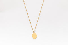 Gold oval pendant