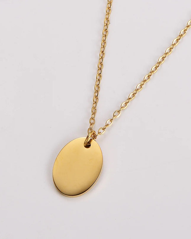 Gold oval pendant